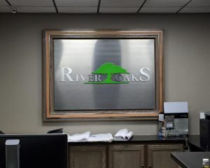 custom indoor metal lobby sign